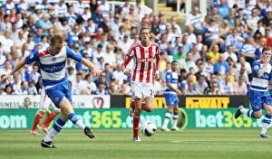 Images Dated 18th August 2012: Saturday, 18th August 2012: A Fierce Encounter between Reading and Stoke City