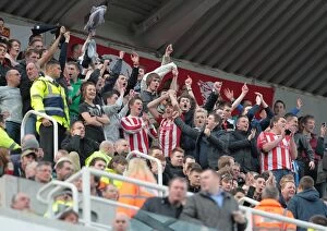 Images Dated 21st April 2012: Stoke City Fans in Action: Newcastle United vs Stoke City, April 21, 2012