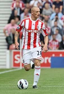 Images Dated 26th August 2012: Stoke City vs Arsenal: Clash at the Britannia Stadium - August 25, 2012