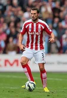 Images Dated 4th September 2014: Stoke City vs Aston Villa: Clash of the Potters and Villans (16th August 2014)