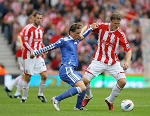 Images Dated 14th August 2011: Stoke City vs Chelsea: Clash at the Bet365 Stadium - August 14, 2011