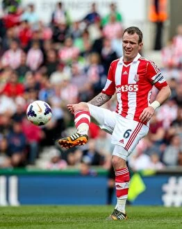 Images Dated 13th May 2014: Stoke City vs Fulham: Battle at the Bet365 Stadium - May 3, 2014