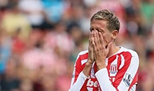 Images Dated 13th September 2014: Stoke City vs Leicester City: Clash of the Potters and Foxes (September 13, 2014)