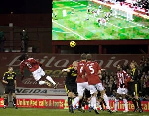 Images Dated 13th November 2010: Stoke City vs Liverpool: A Clash at the Britannia Stadium - November 13, 2010