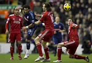Images Dated 2nd February 2011: Stoke City vs. Liverpool: Intense Battle on the Soccer Field - 2nd February 2011
