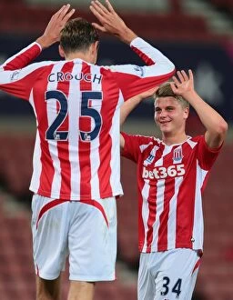 Images Dated 4th September 2014: Stoke City vs Portsmouth Clash at Bet365 Stadium - August 27, 2014