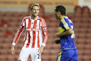 Images Dated 28th August 2012: Stoke City vs Swindon Town Clash: August 28, 2012 at Bet365 Stadium