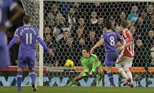 Images Dated 11th December 2011: Stoke City vs. Tottenham Hotspur: Clash at the Britannia Stadium (December 11, 2011)