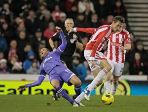 Images Dated 11th December 2011: Stoke City vs. Tottenham Hotspur Clash at Bet365 Stadium: December 11, 2011