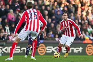 Images Dated 2nd January 2015: Stoke City vs. West Bromwich Albion: Clash at the Bet365 Stadium - December 28, 2014