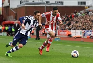 Images Dated 23rd October 2013: Stoke City vs. West Bromwich Albion: Clash at the Bet365 Stadium - October 19, 2013