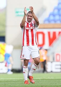 Images Dated 1st September 2012: Stoke City vs Wigan Athletic: Clash at DW Stadium - September 1, 2012