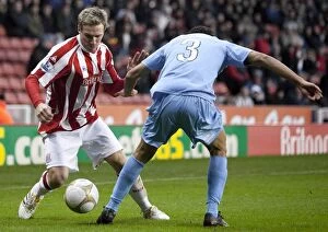 Images Dated 2nd January 2010: Stoke City vs York City: Battle on the Football Field (January 2, 2010)