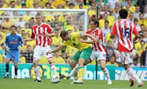 Images Dated 21st August 2011: Sunday Showdown: Norwich City vs. Stoke City - August 21, 2011