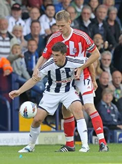 Images Dated 28th August 2011: Sunday Showdown: West Bromwich Albion vs. Stoke City - August 28th